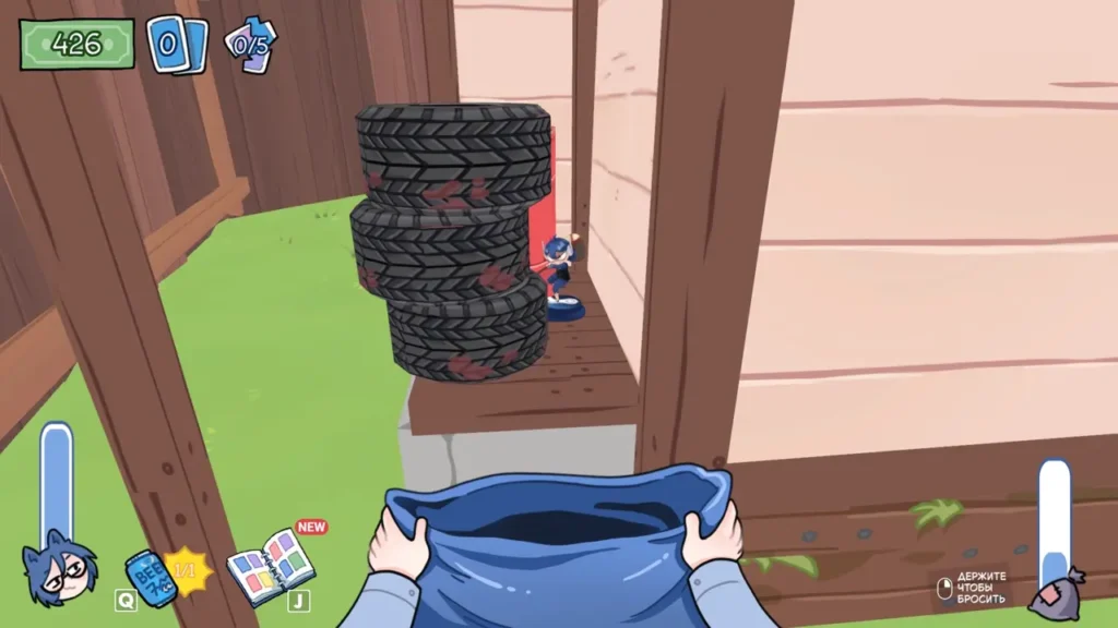 Figurine behind the house opposite the recycling area in KOTAMON Game