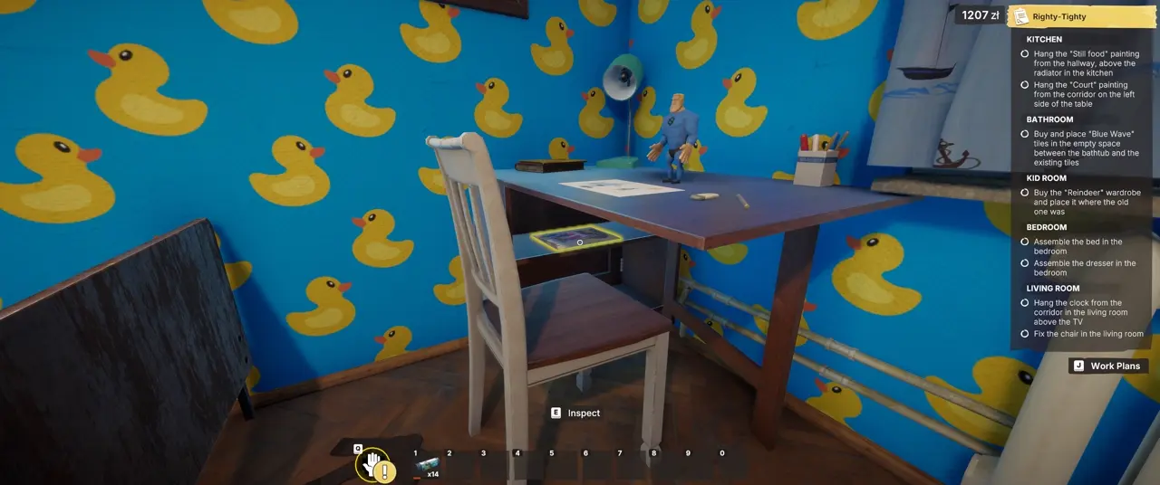 Binder with children's cards location under the desk in Righty-Tighty
