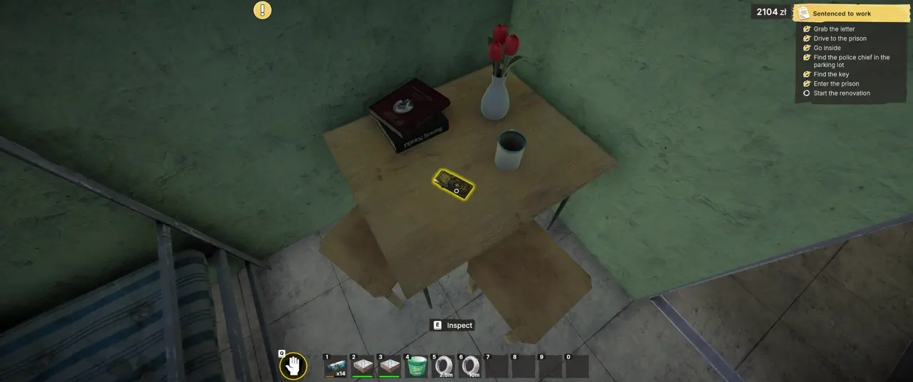 Gypsy tarot cards on the table beside the bunk in Cell E