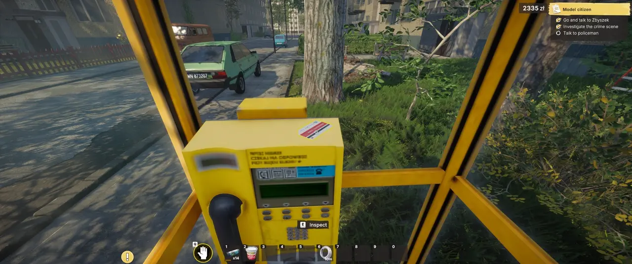 Phone card on top of the yellow payphone