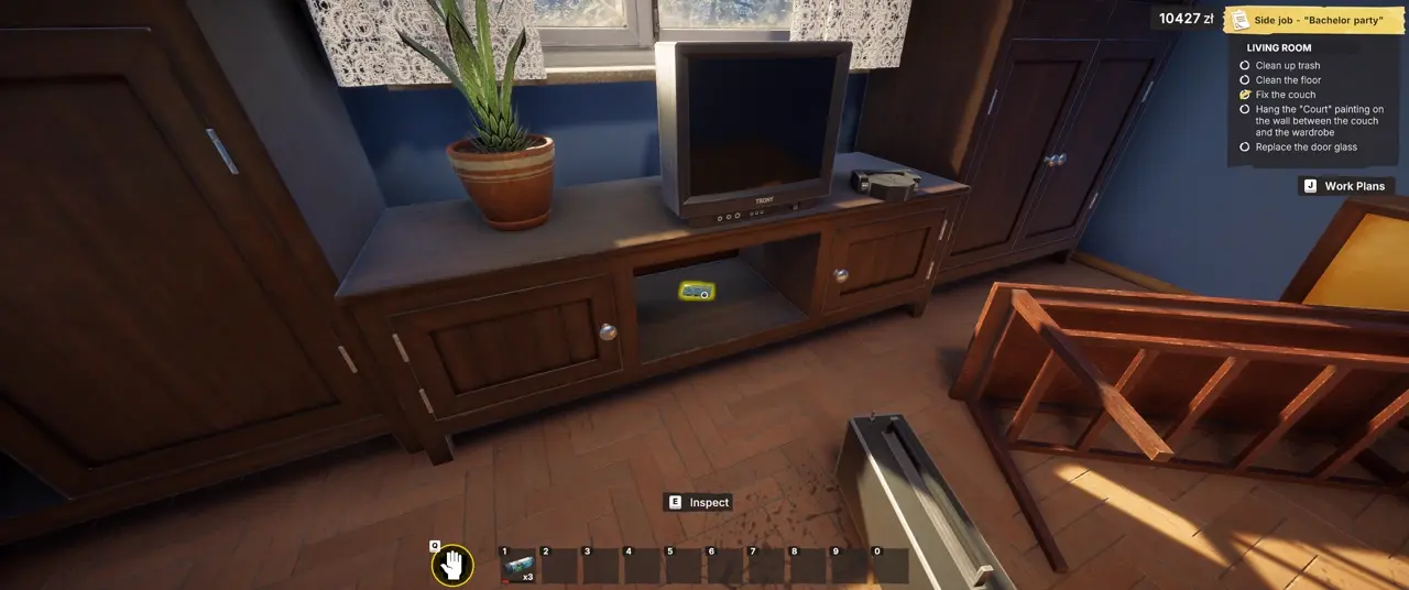Cassette tape hidden behind the radio below the television