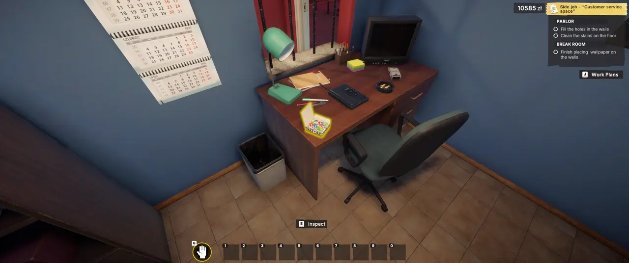 Chewing gum with cars packet on the front-left corner of the desk